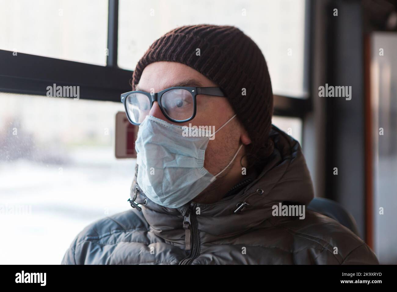 Portrait of a man in glasses and face medical mask in the bus Stock ...