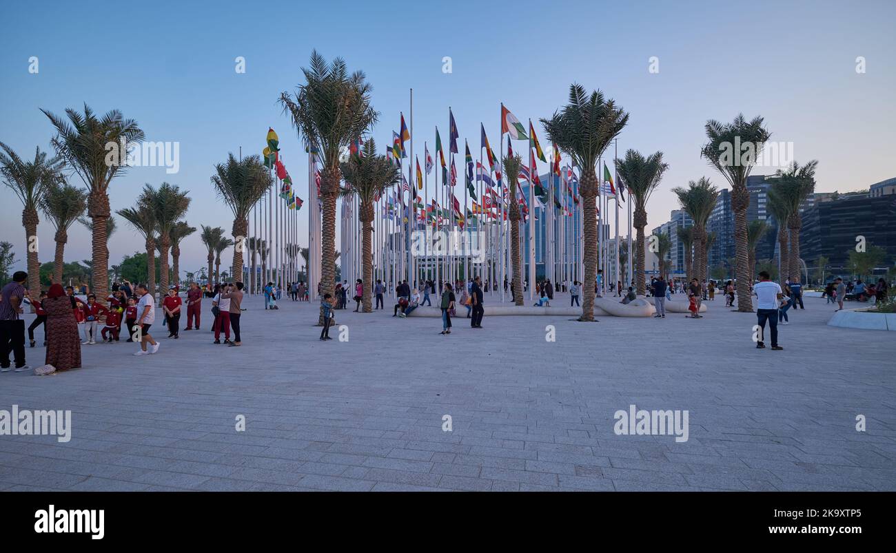 Doha corniche sunset view showing flags of the participating countries with people celebrating. Qatar preparation for FIFA world cup 2022 Stock Photo
