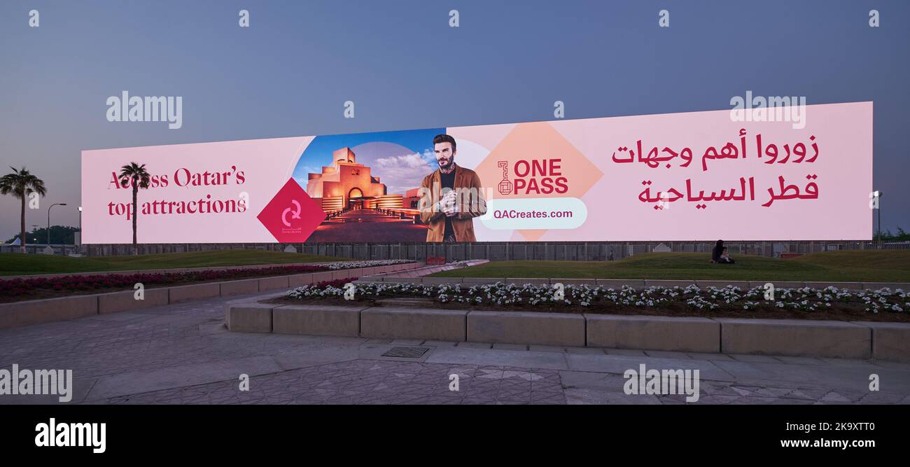 Doha corniche sunset view showing large outdoor screen promoting