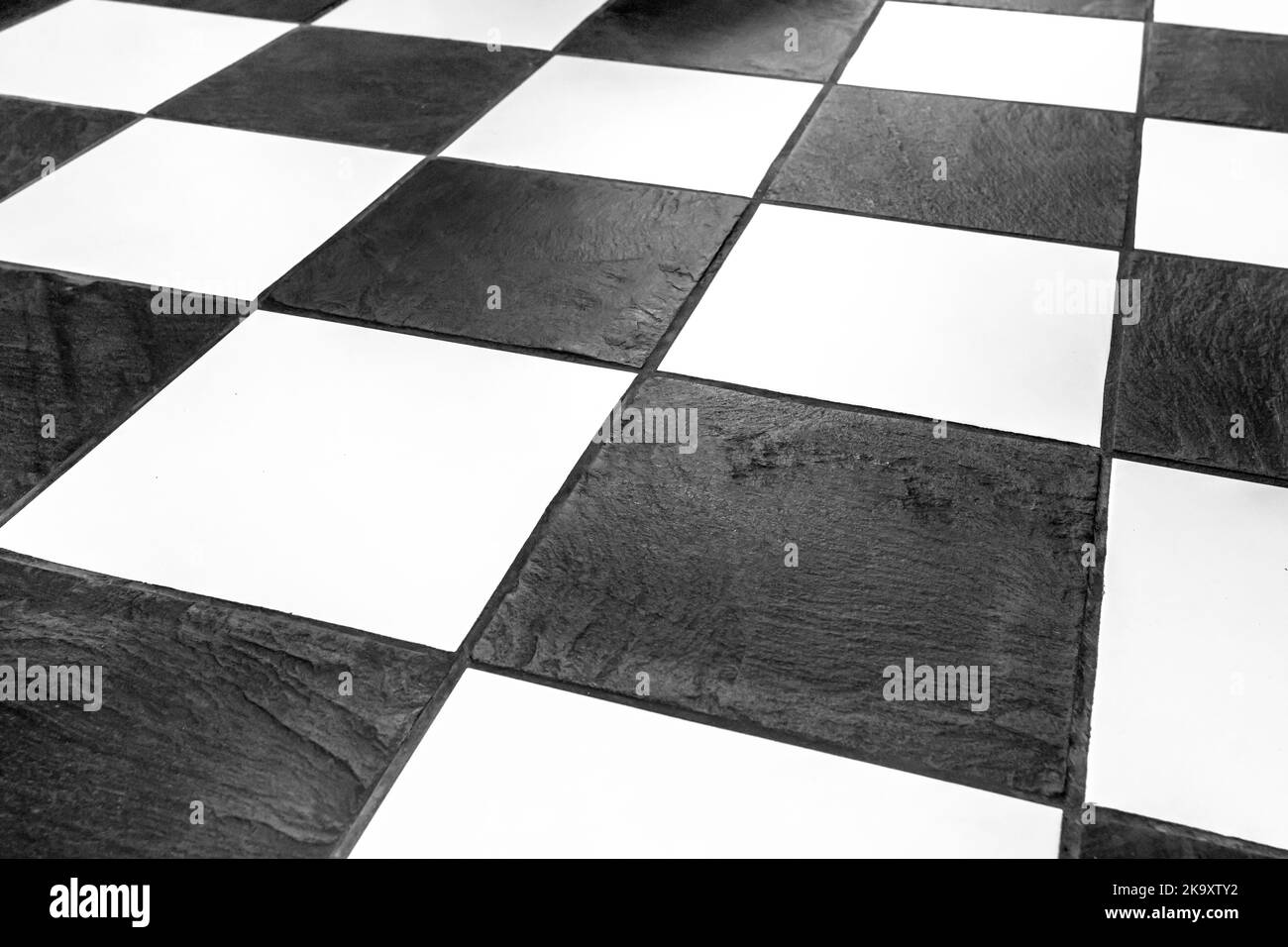 Floor tilesmosaic background, interior design. The black and white