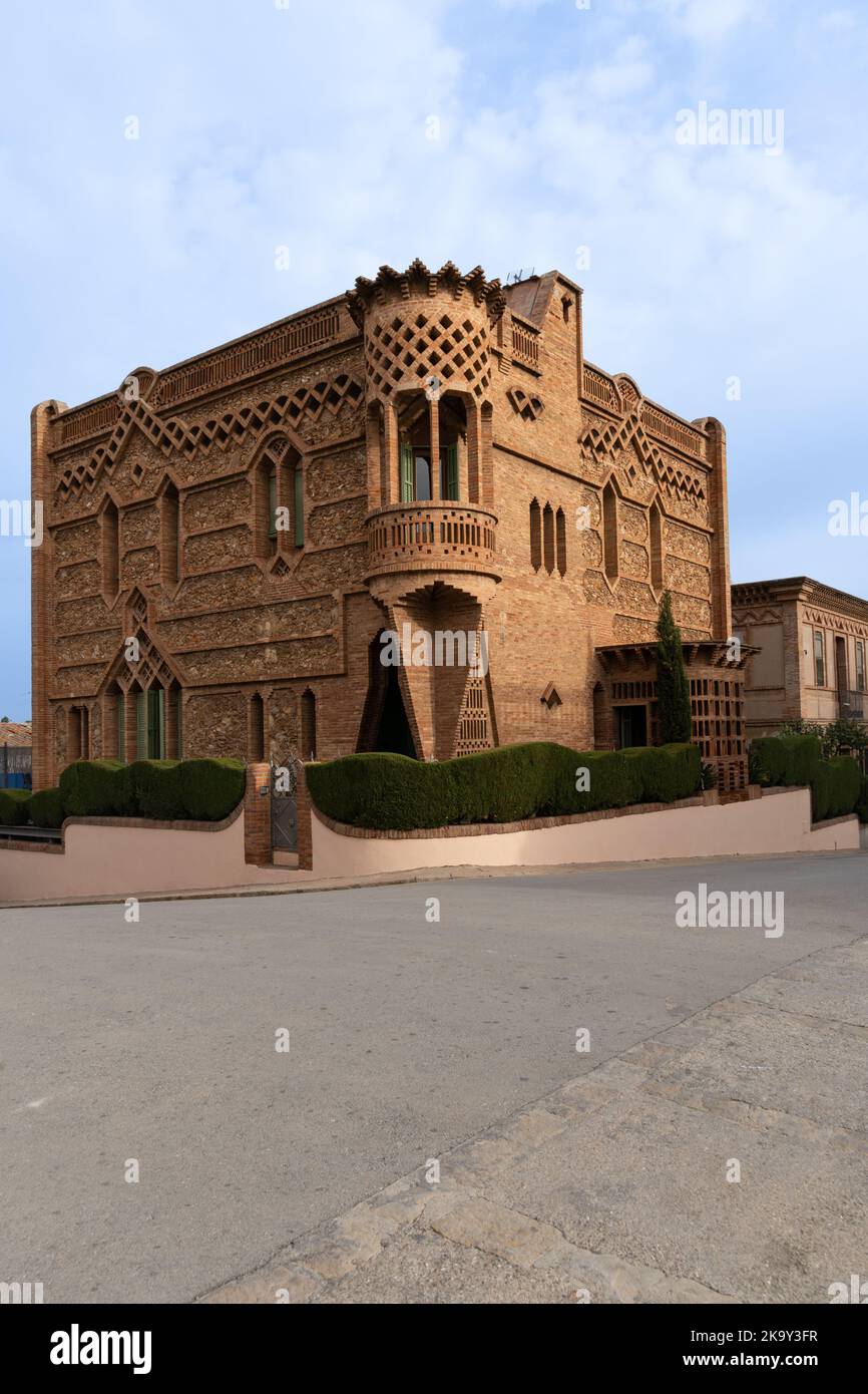 Barcelona, Spain - October 23, 2022: A view of the Cal Espinale building in the Colonia Guell district in Santa Coloma de Cervello, Spain, built in mo Stock Photo