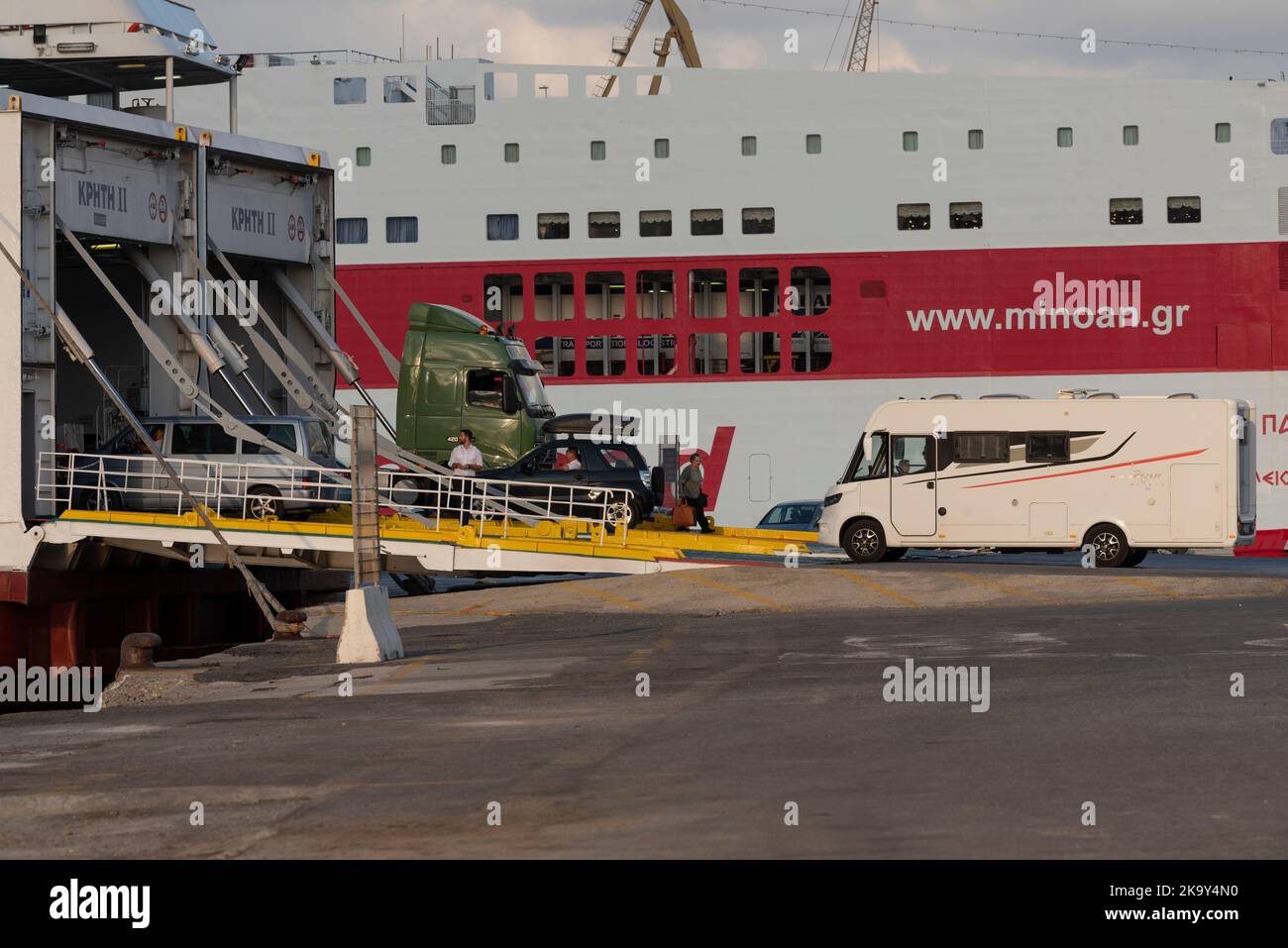 Heraklion, Crete, Greece. 2022. Large commercial truck and a motorhome loading onto a ferry in port of Heraklion. Stock Photo