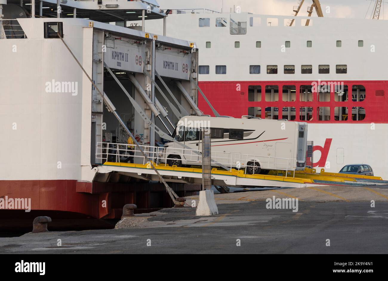 Heraklion, Crete, Greece. 2022. A holiday motorhome on ramp loading onto a ferry in port of Heraklion. Stock Photo