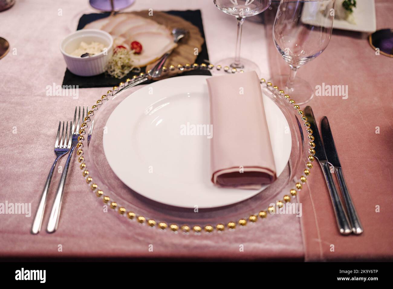 Element of decor on the table in restaurant. Cutlery and different dishes. Close-up Stock Photo