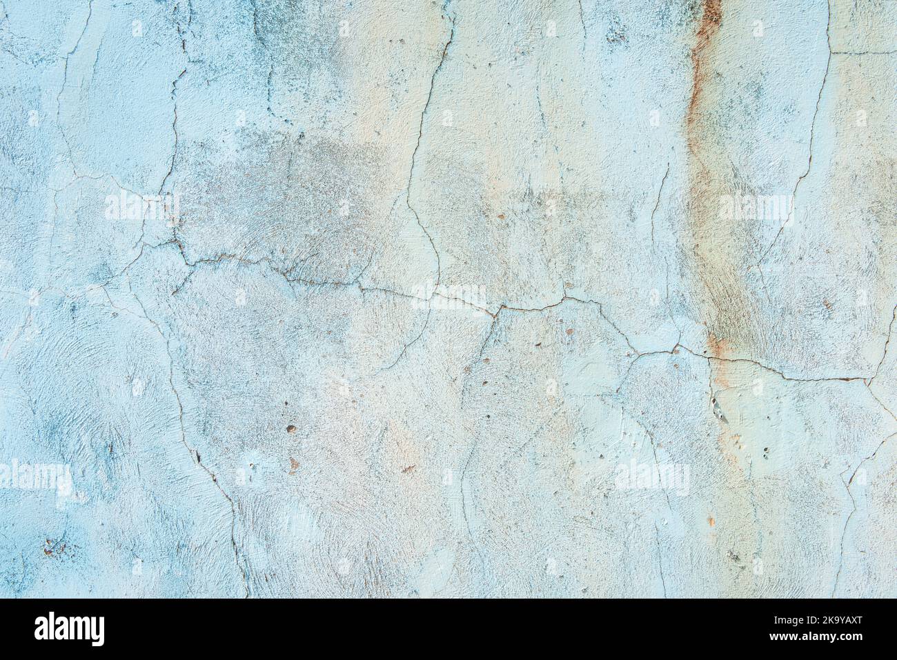 Wall texture deteriorated by moisture and sun Stock Photo