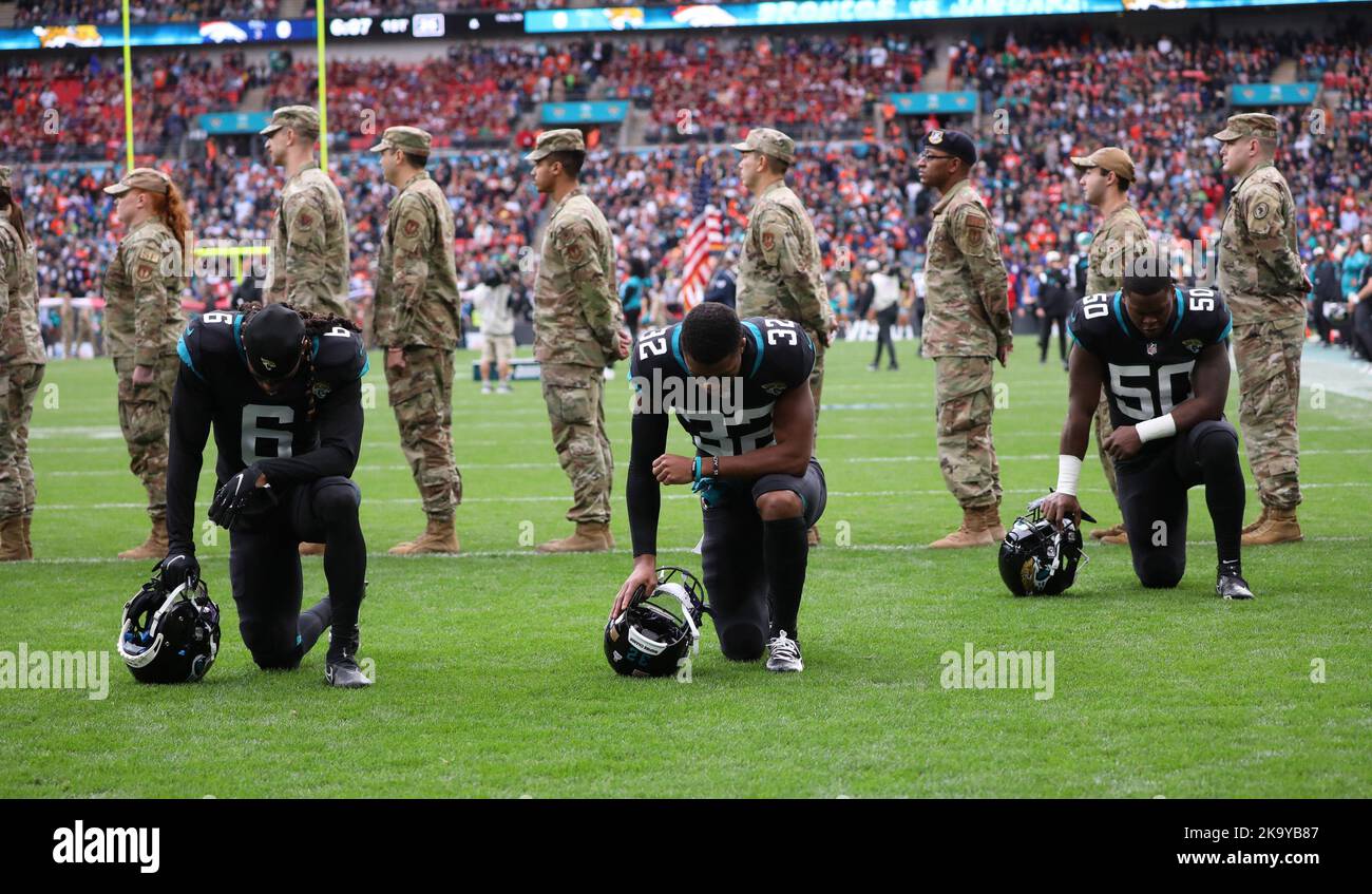 London, UK. 30th Oct, 2022. Jacksonville Jaguars players pray before the match against the Denver Broncos in the NFL International Series game at Wembley in London on Sunday, October 30, 2022. Broncos won the match 21-17. Photo by Hugo Philpott/UPI Credit: UPI/Alamy Live News Stock Photo