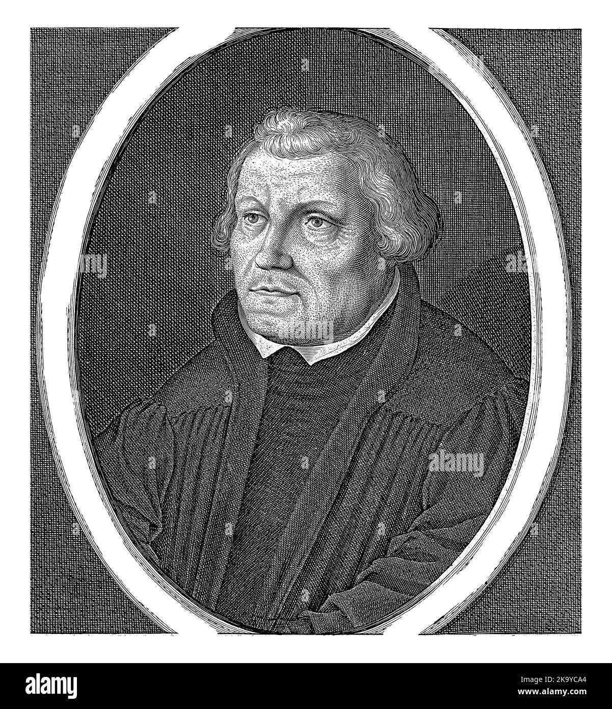 Bust of the theologian Martin Luther, facing left, in oval with edge lettering. Below the portrait is a Dutch verse by C. Victor. Stock Photo