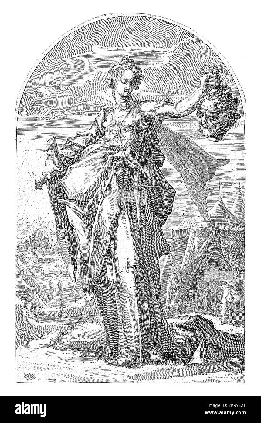 Judith with the head of Holofernes in one hand, the sword in the other. In the background the scene in which she cuts off the head of the army command Stock Photo