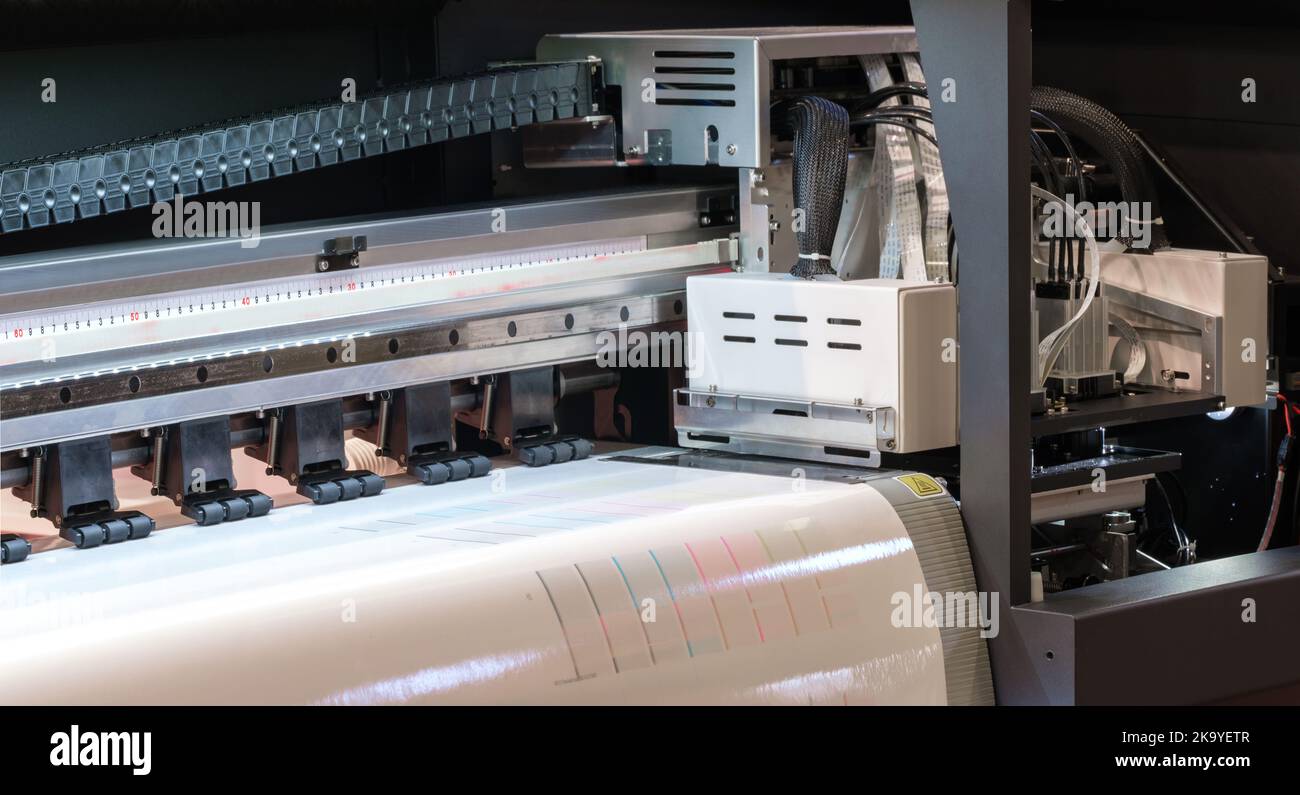 Wide-format inkjet printer, prints color stripes for proofing. industrial printing modern digital inkjet printer Industrial printing modern digital in Stock Photo