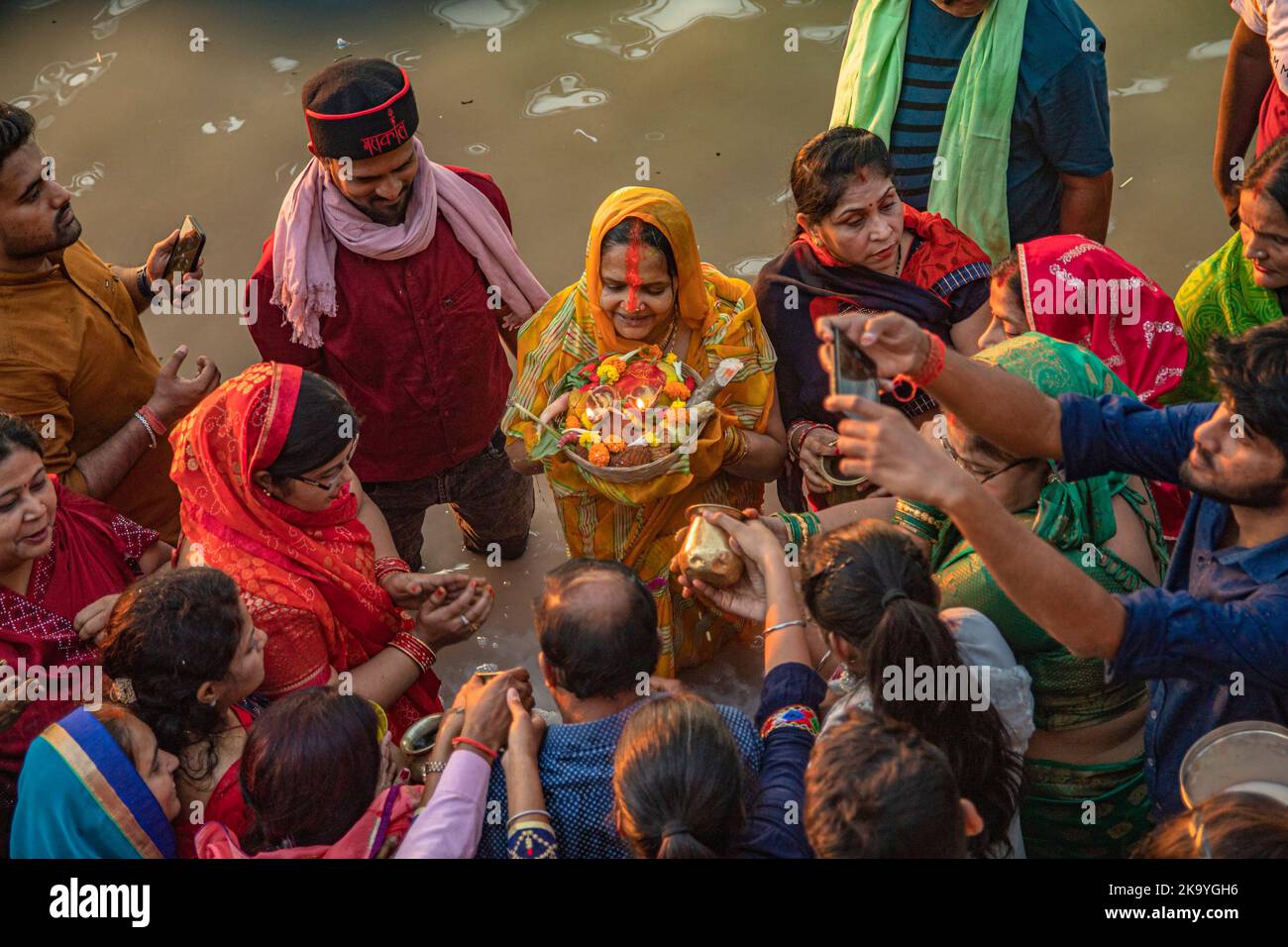 Chhath is a Hindu festival mainly celebrated at Bihar Jharkhand Utter Pradesh West Bengal and the Napalese province of Madhesh and Lumbini. Prayers during Chhath puja is mainly dedicated to solar diety, Surya mainly to show gratitude and thankfullness for bestowing the bounties of life and earth and to request certain wishes to be fulfilled. Chhath Maiya, the sixth form of Devi Prakriti and Lord Suryas sister is worshiped as the Godess of the festival on the sixth day of lunar month month of kartik (October - Noverber) as per Hindu callender. This include fasting, holy bathing, abstaining fro Stock Photo