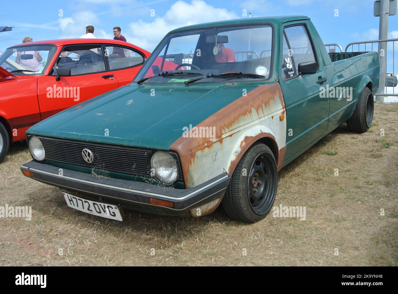A 1990 Volkswagen Caddy pickup truck parked on display at the English