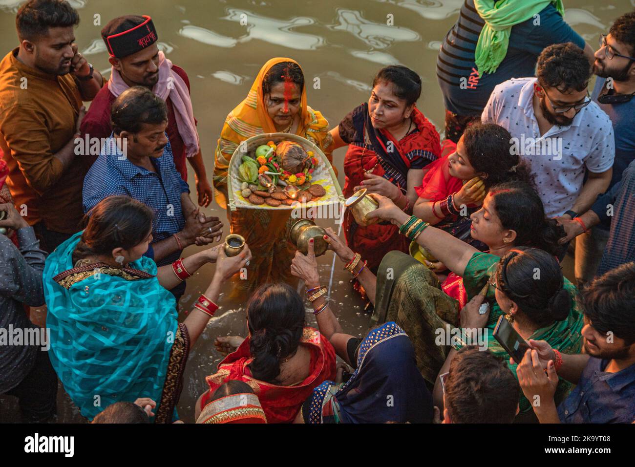 Kolkata, West Bengal, India. 30th Oct, 2022. Chhath is a Hindu festival mainly celebrated at Bihar Jharkhand Utter Pradesh West Bengal and the Napalese province of Madhesh and Lumbini. Prayers during Chhath puja is mainly dedicated to solar diety, Surya mainly to show gratitude and thankfullness for bestowing the bounties of life and earth and to request certain wishes to be fulfilled. Chhath Maiya, the sixth form of Devi Prakriti and Lord Suryas sister is worshiped as the Godess of the festival on the sixth day of lunar month month of kartik (October - Noverber) as per Hindu callender. Thi Stock Photo