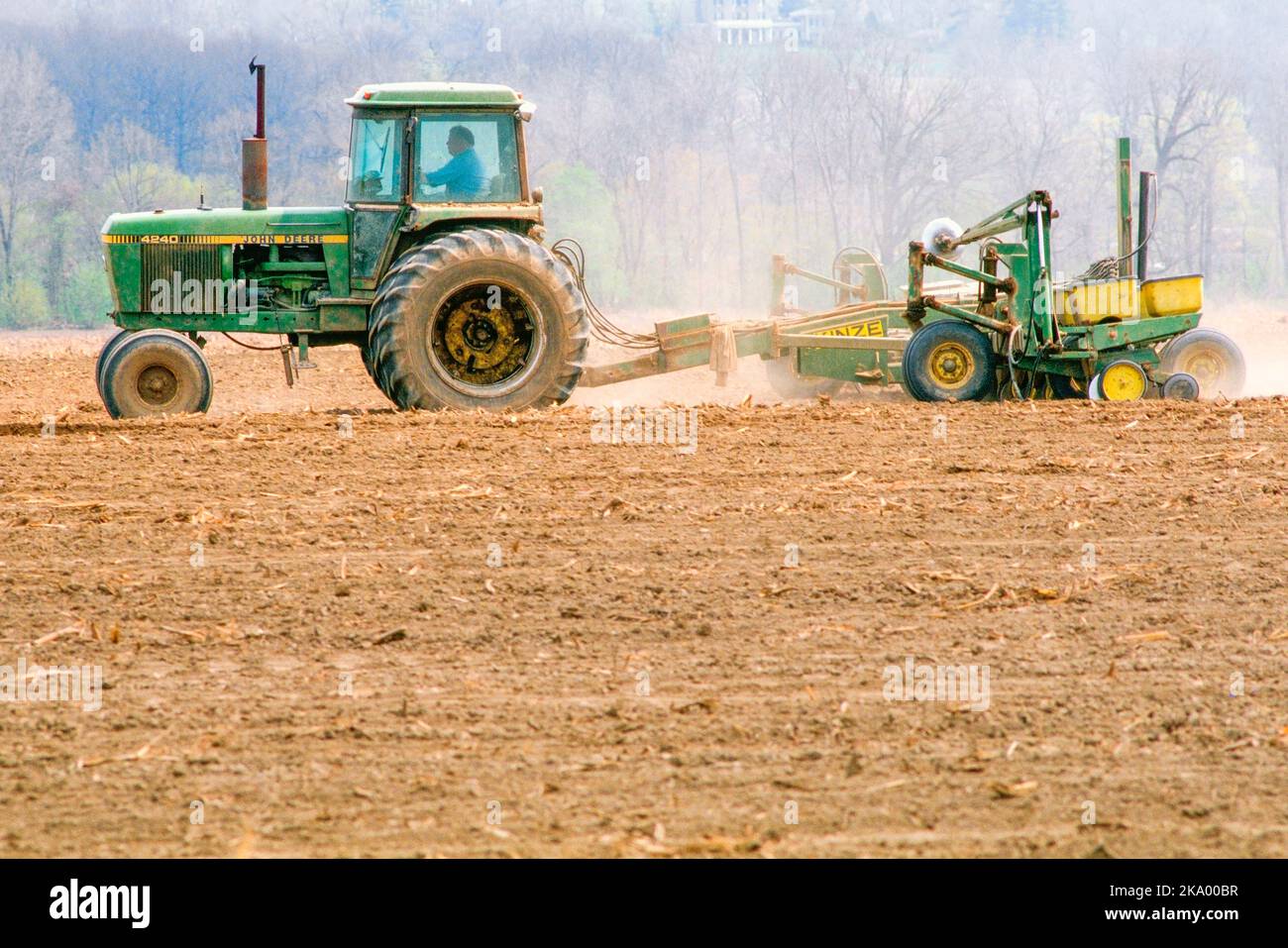 Planting Corn. John Deere 4240 Tractor. Livingston County. Geneseo, New York Stock Photo