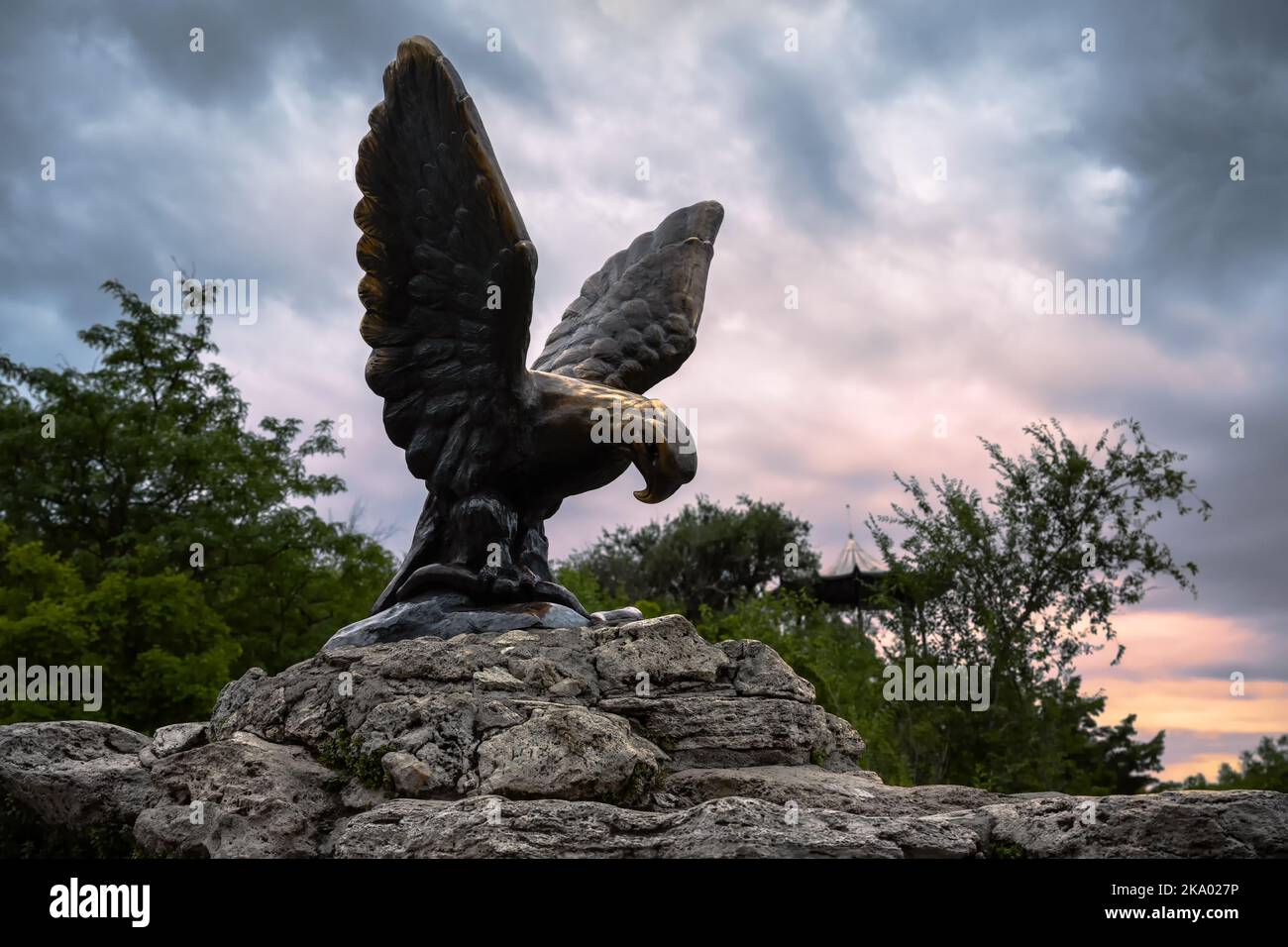 Eagle statue at sunset, Pyatigorsk, Stavropol Krai, Russia. Scenery of historical city landmark, old symbol of Pyatigorsk installed in 1901. Monument Stock Photo