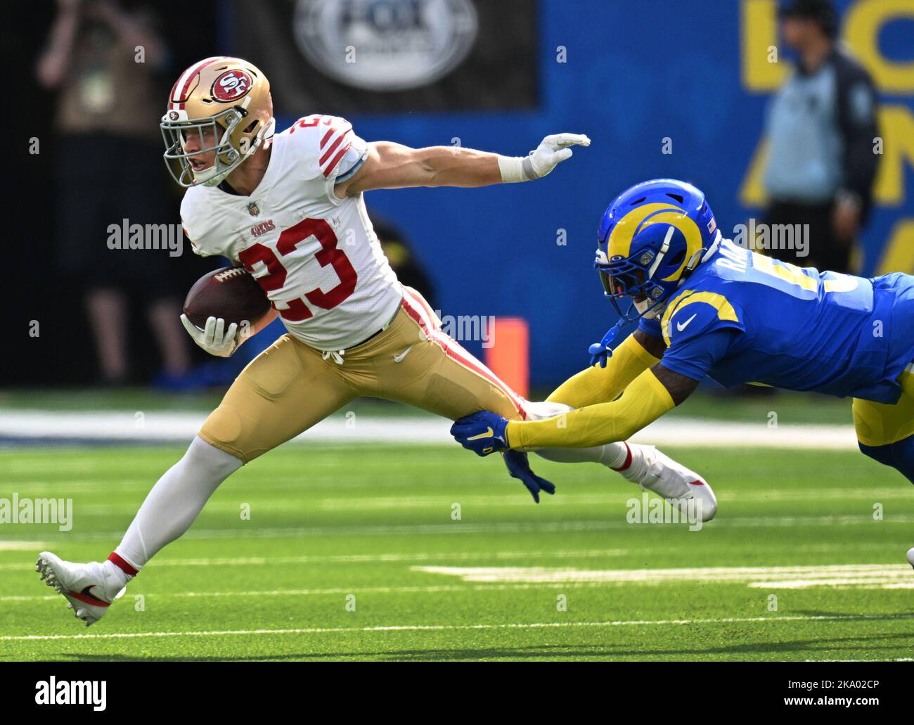 Inglewood, United States. 30th Oct, 2022. San Francisco 49ers Christian McCaffrey is tackled by Los Angeles Rams Jalen Ramsey at SoFi Stadium in Inglewood, California on Sunday, October 30, 2022. The Rams lead the 49ers at halftime 14-10. Photo by Jon SooHoo/UPI Credit: UPI/Alamy Live News Stock Photo