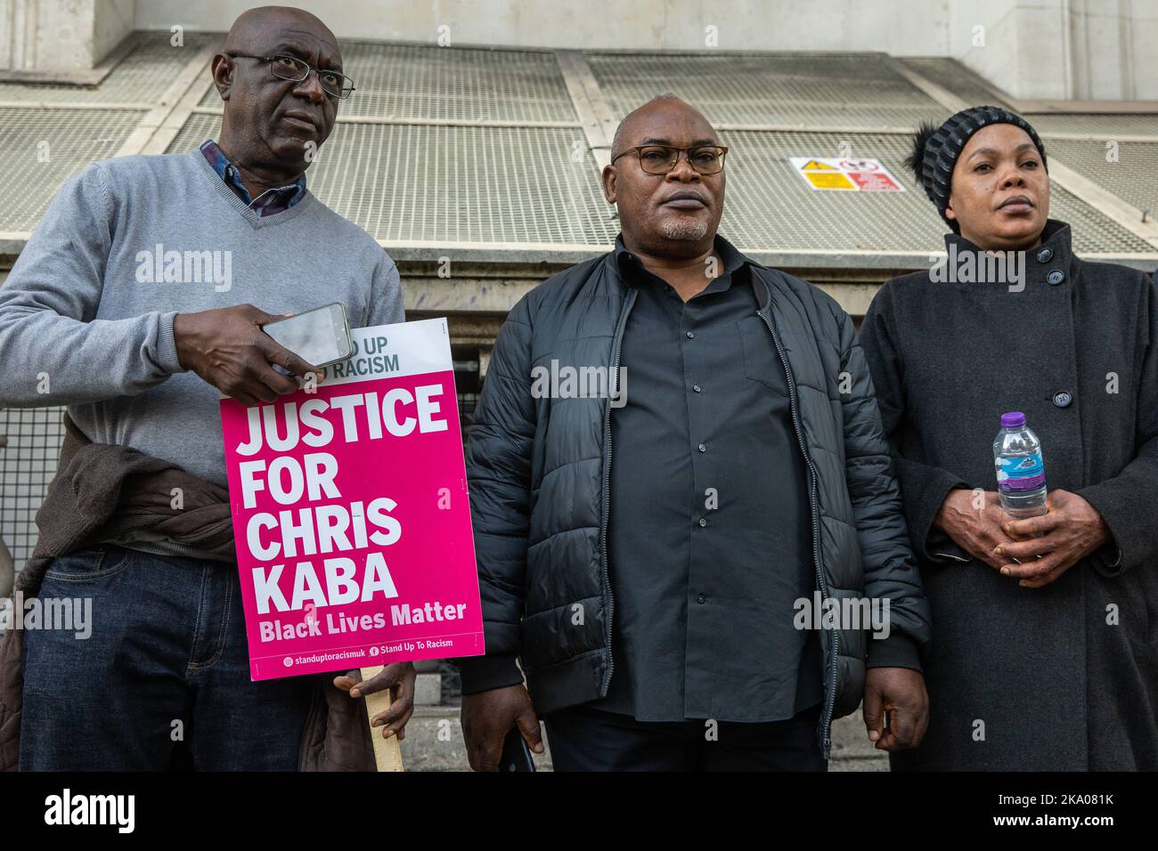 London, UK. 29th October, 2022. Prosper Kaba (c) and Nkama Lumuanganu (r), the father and mother of Chris Kaba, stand outside Downing Street following the annual United Families & Friends Campaign (UFFC) procession in remembrance of family members and friends who died in police custody, in prison, in immigration detention or in secure psychiatric hospitals. Chris Kaba, 24, who was not a police suspect, was shot dead by a police firearms officer in a residential road in Streatham on 5 September 2022. There have been 1,838 deaths in police custody or otherwise following contact with the police i Stock Photo