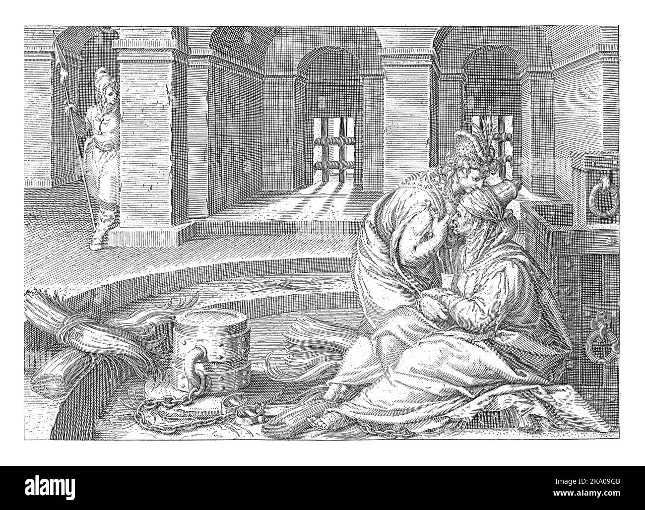 A daughter keeps her mother alive by visiting her in prison and breastfeeding her. The mother is sitting on the floor, the daughter is bent over and b Stock Photo