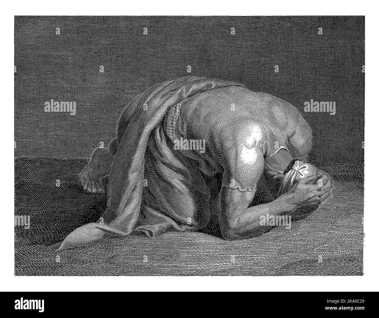 A study of a man who lies with his head bent forward on the floor and