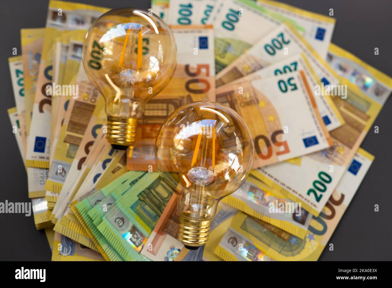 Electricity costs in EU.Payment of electricity bills.Light bulbs set