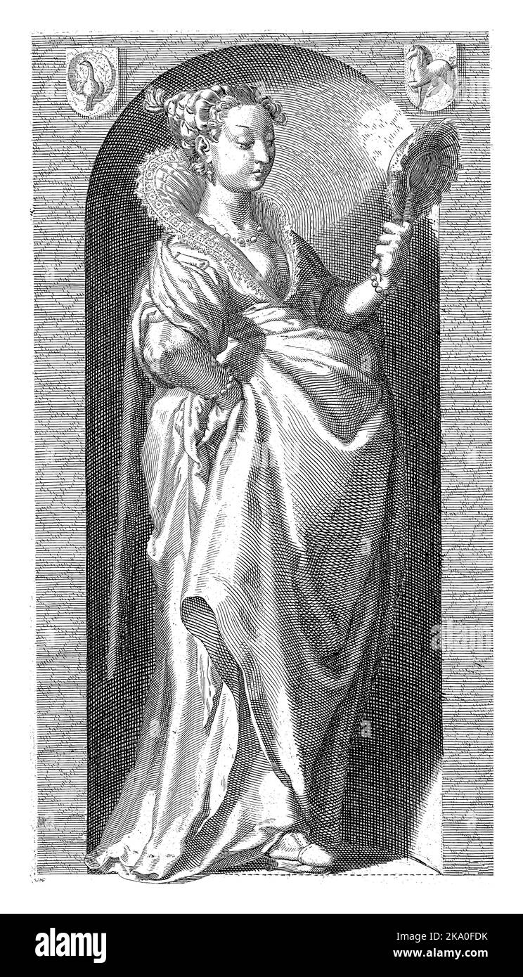 Personification of vanity or pride, depicted as a richly dressed female figure looking into a mirror, standing in a niche. Stock Photo