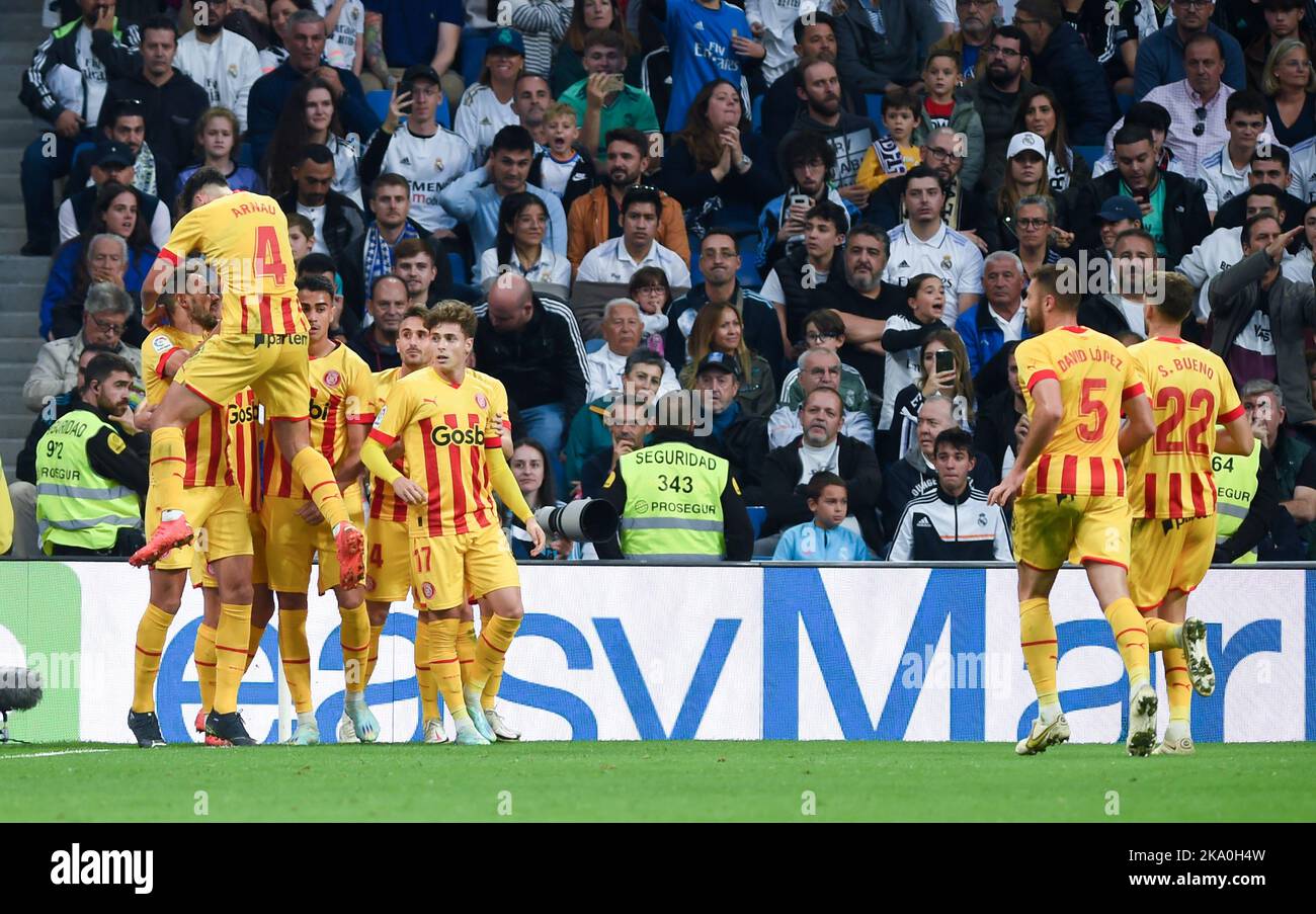 Madrid, Spain. 30th Oct, 2022. Players of Girona celebrate a goal by teammate Cristhian Stuani during a Spanish La Liga football match between Real Madrid and Girona in Madrid, Spain, Oct. 30, 2022. Credit: Gustavo Valiente/Xinhua/Alamy Live News Stock Photo