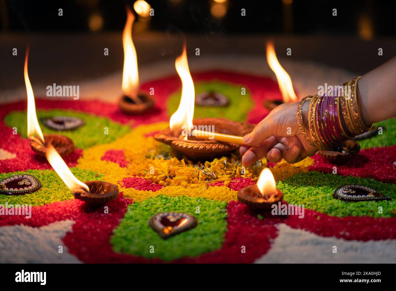 Traditional diya lamps lit during diwali celebration Stock Photo