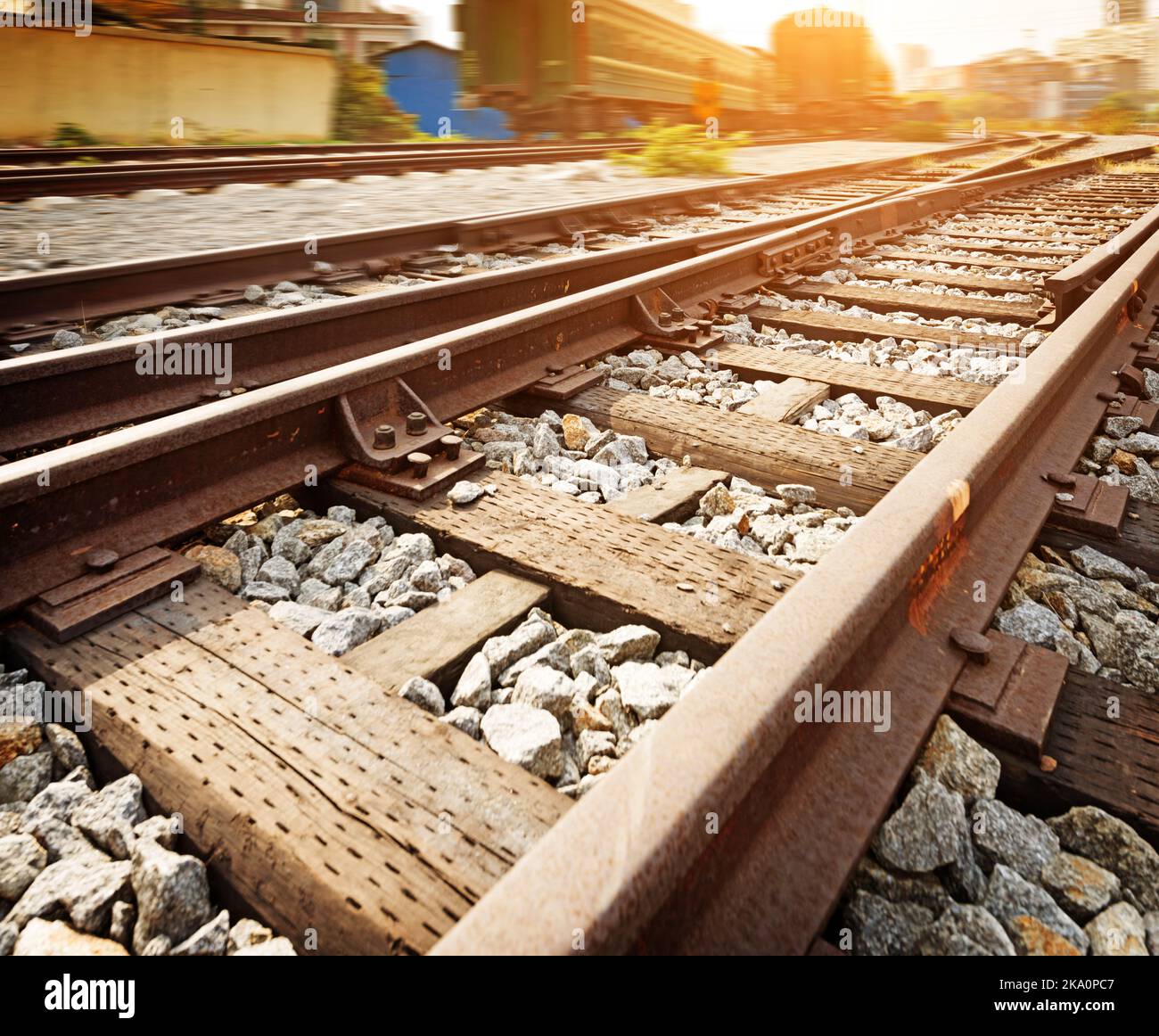 Cargo train platform at sunset with container Stock Photo - Alamy