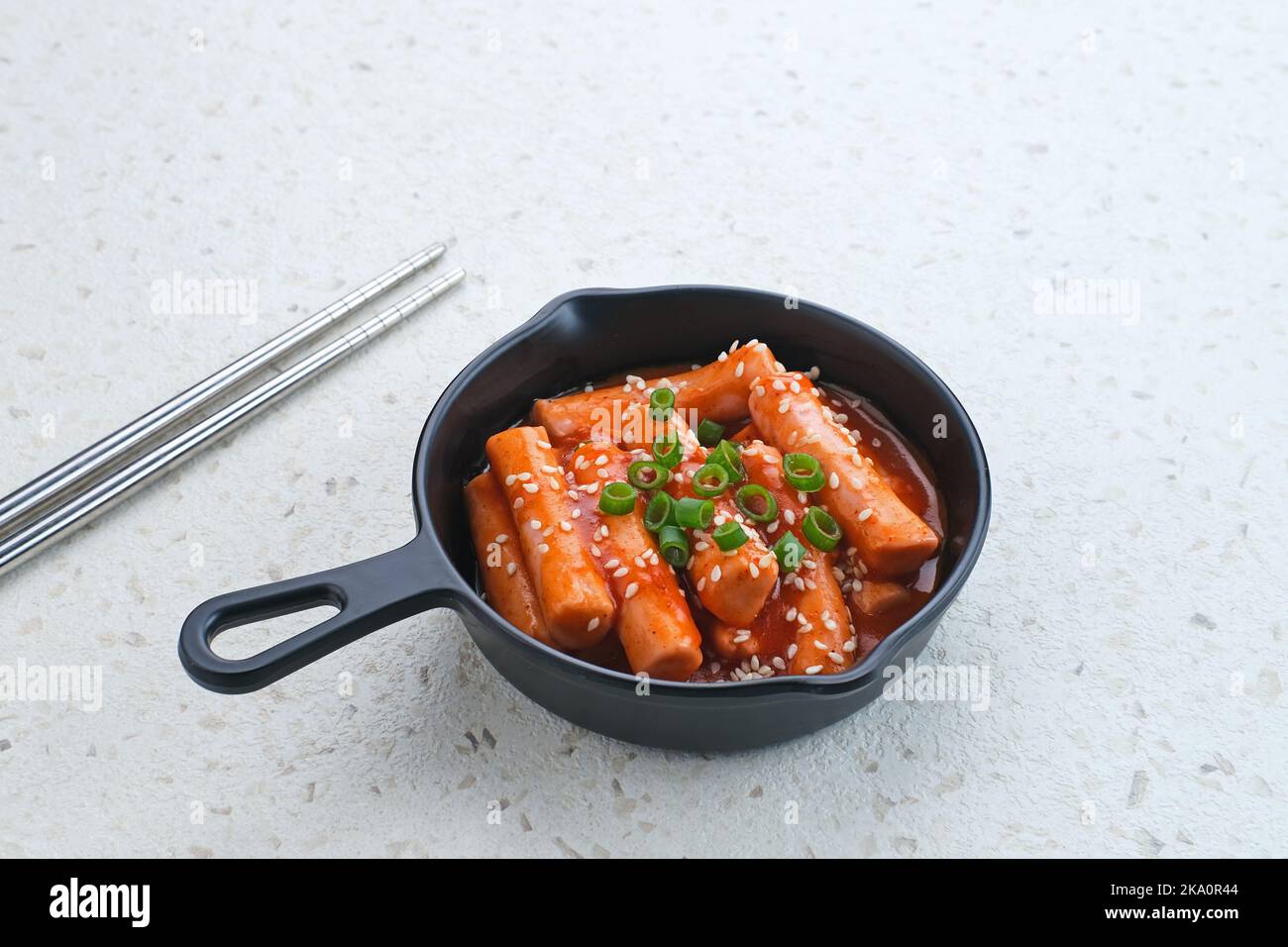 Tteokbokki or Topokki , stir fried rice cake stick, popular Korean street food with spicy