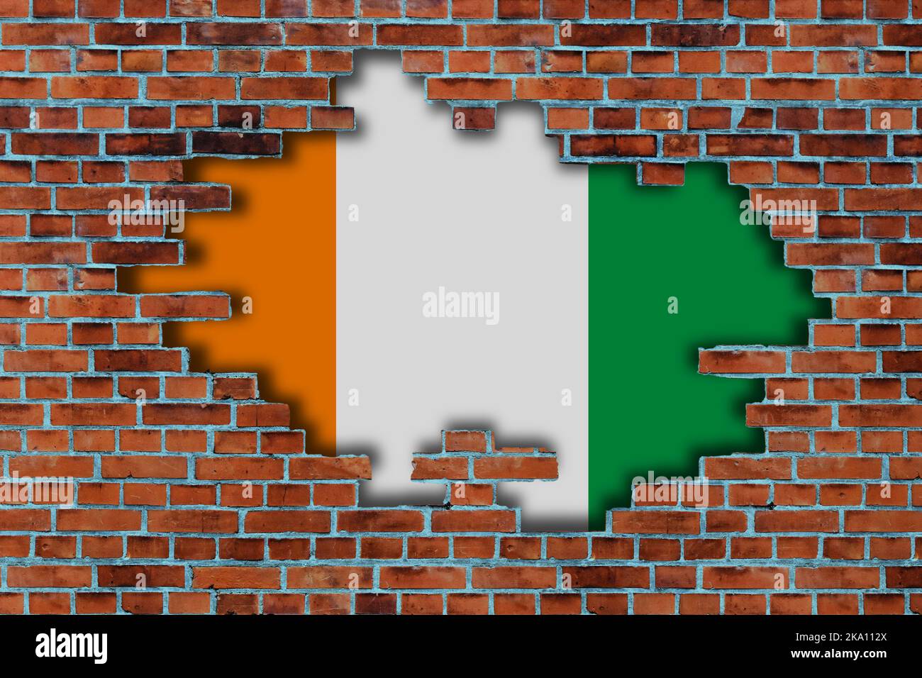 3D Flag of Ivory Coast behind the broken old stone wall background ...