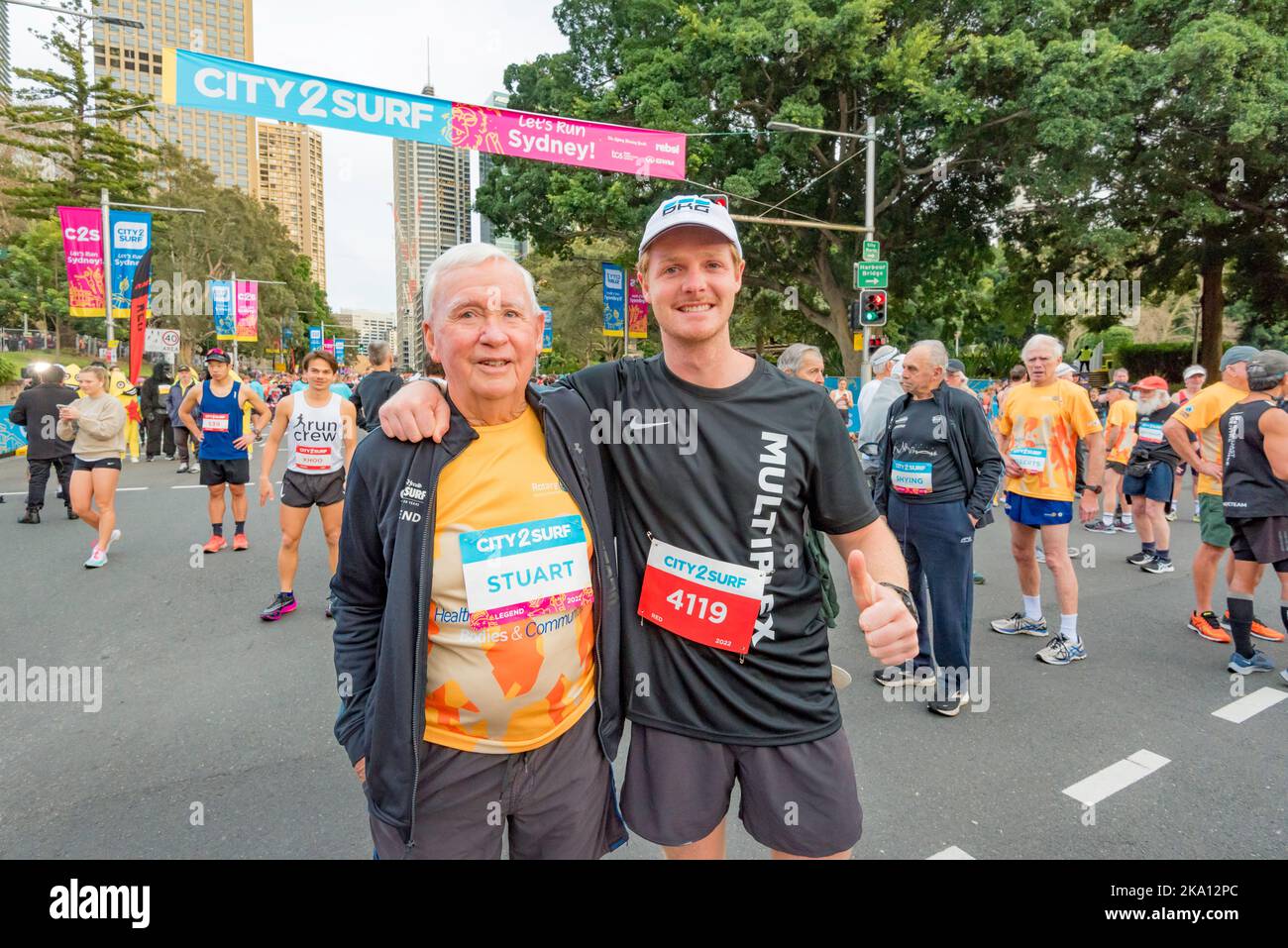 Robert Stuart, one of the Sydney City to Surf race legends who have run in every race since 1971. Pictured here with his grandson before the 2022 run Stock Photo