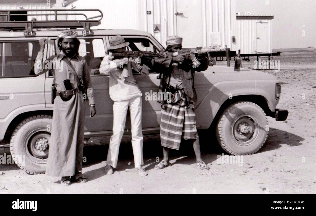 Photojournalist Christine Osborne learns how to fire an AK47 in Yemen