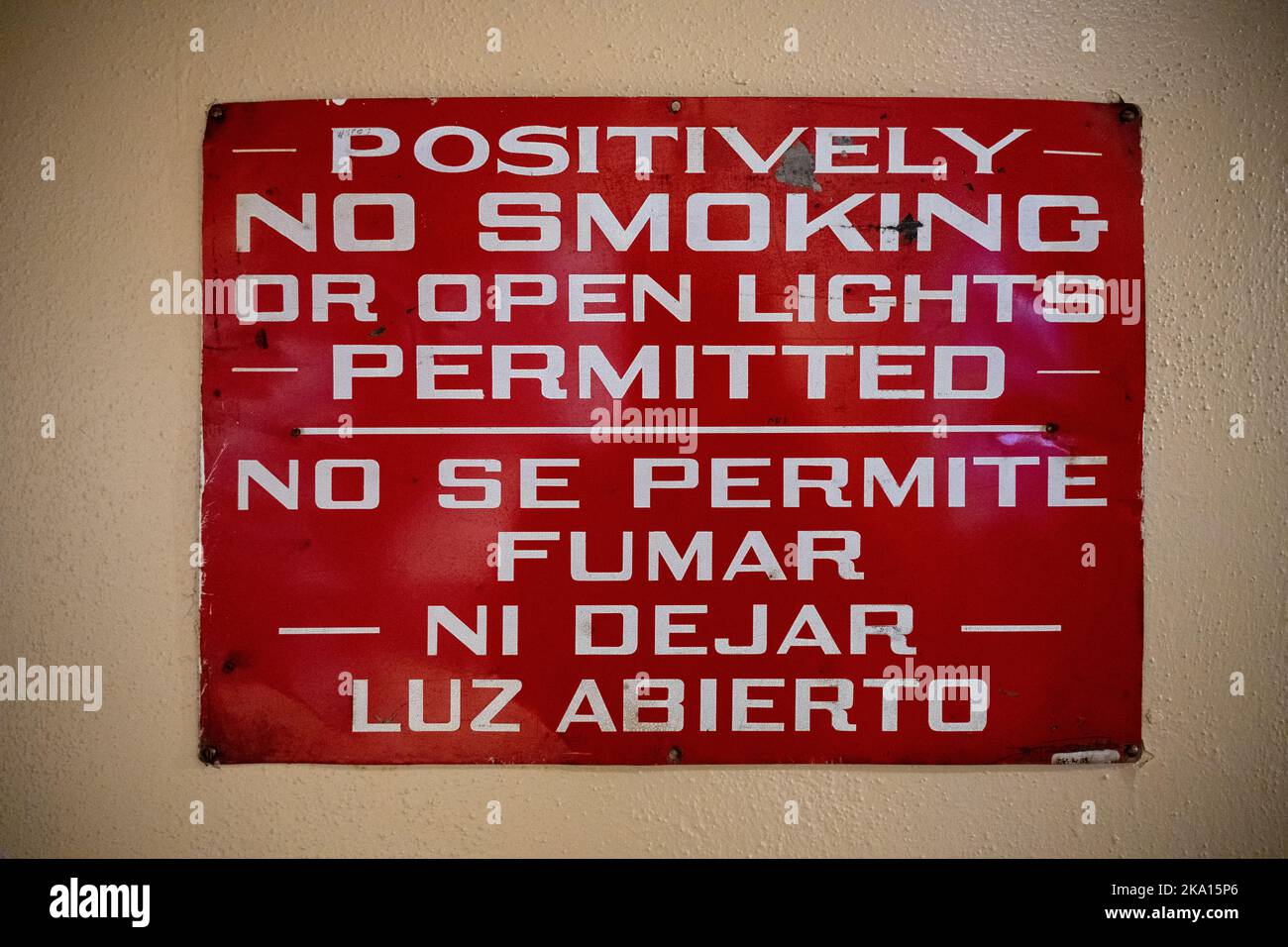 A warning sign form a mine that states Positively no smoking or open