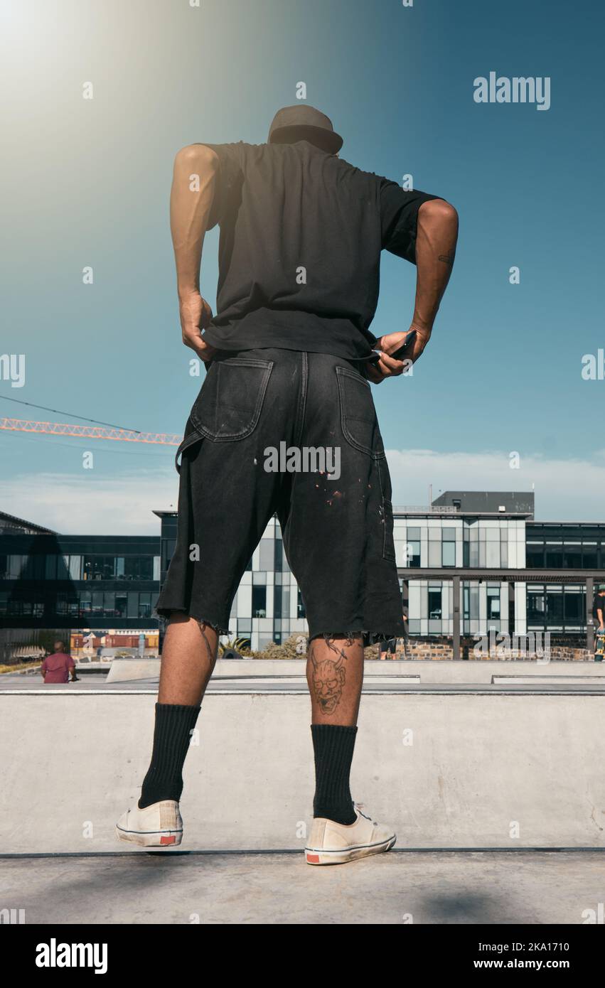 Skate clothes, urban fashion and man with emo, goth or gen z