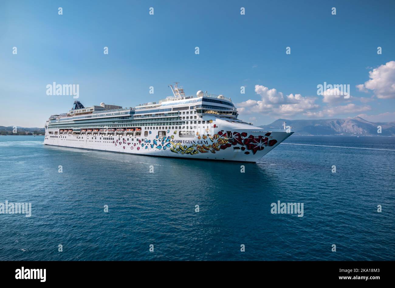 CORFU, GREECE - SEPTEMBER 6, 2022: Cruise Ship Norwegian Gem, Norwegian Cruise Line, sailing away from cruise port in Corfu, Greece. Stock Photo