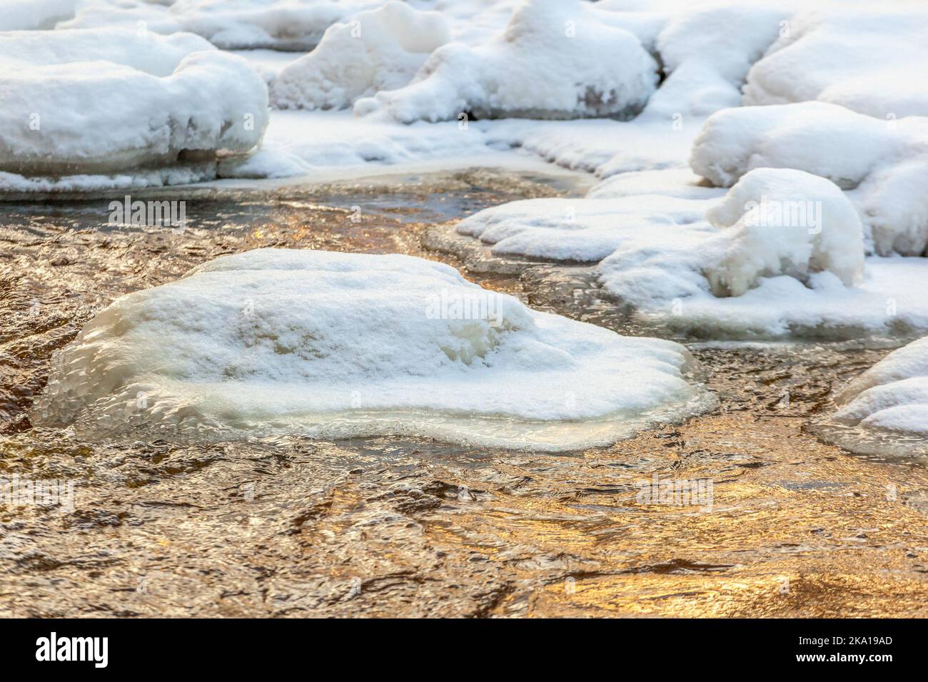 Winter river with snow and ice Stock Photo - Alamy