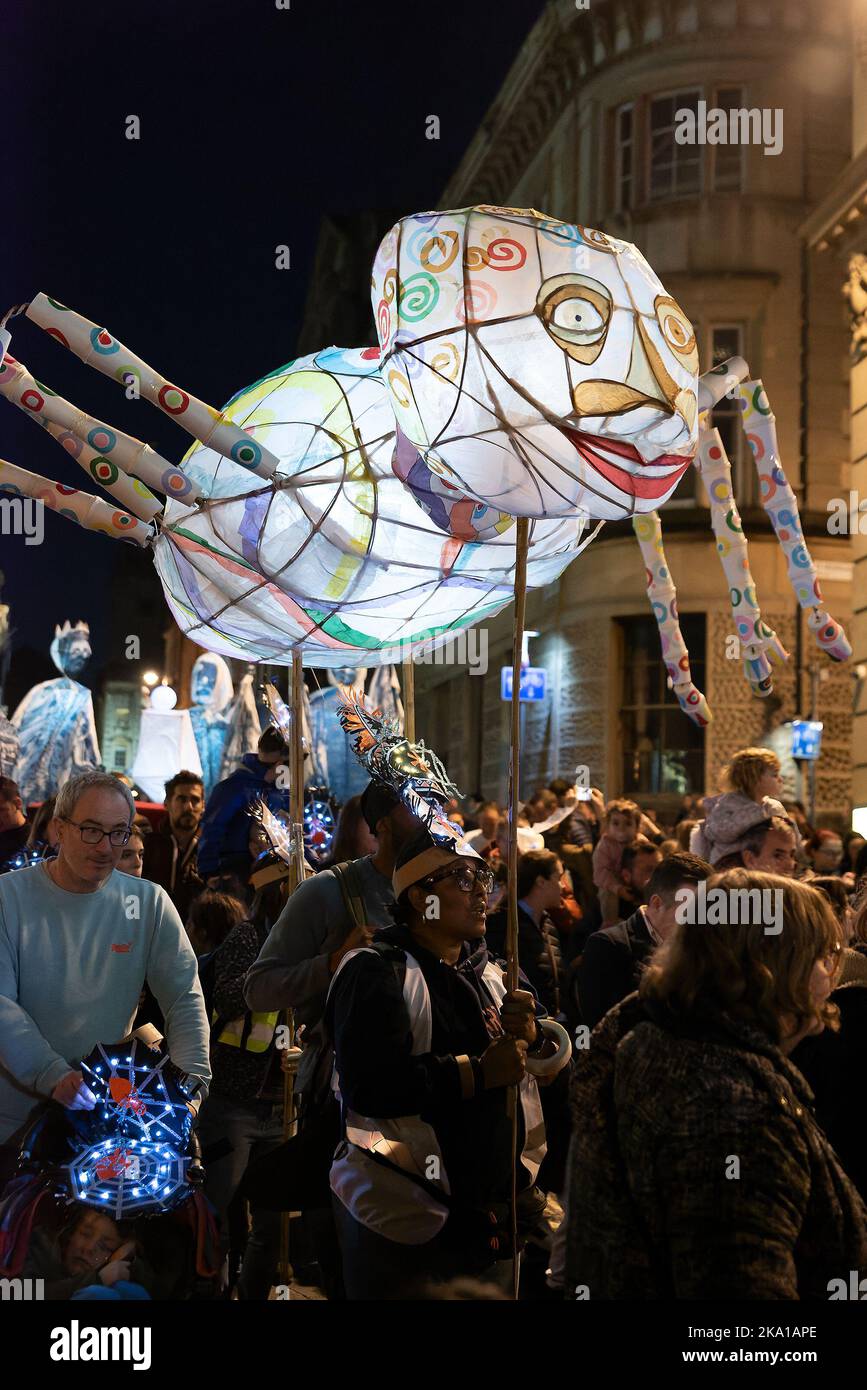 Bristol, UK. 30th October, 2022. Bristol's Spooky Spectacular Lantern Parade. The parade started at dusk, and was led by a giant illuminated puppet representing the 8 foot tall Bristol resident Patrick Cotter (1760 - 1806). Credit: Stephen Bell/ Alamy Live News Stock Photo