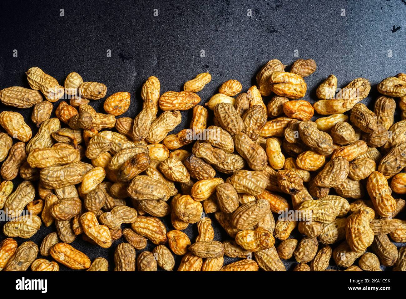Peanut in a shell texture with space for texts. food background of
