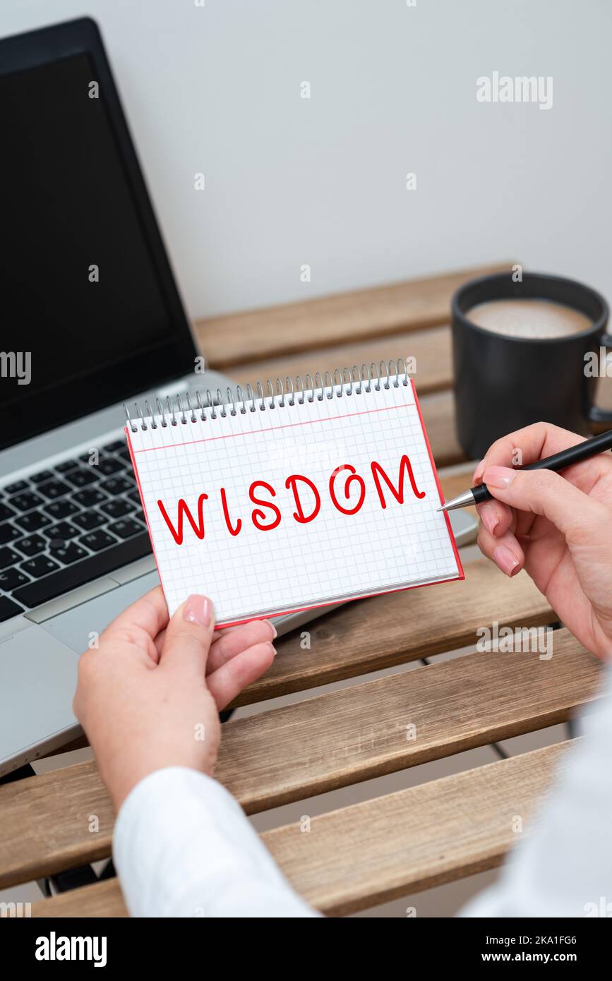 Inspiration showing sign Wisdom. Business approach body of knowledge and principles that develops within specific period Businessman Typing Important Stock Photo