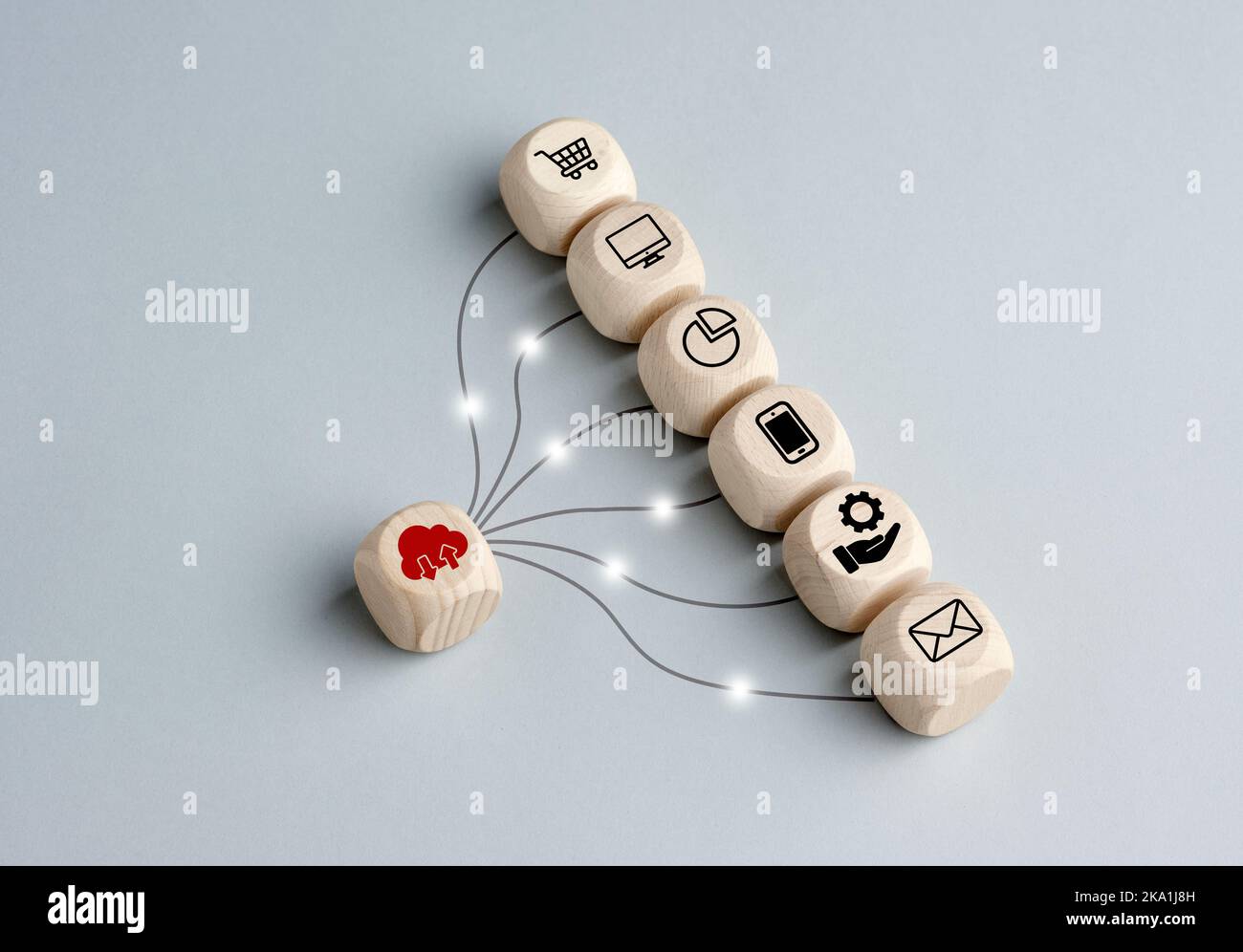 Virtual cloud computing technology or virtualization in cloud computing concept. Wooden cubes linked with transfer communication lines. Stock Photo