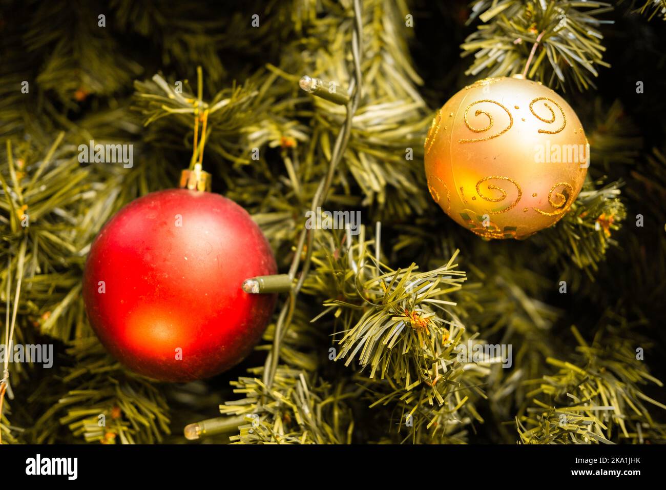 Close-up horizontal photo of two Christmas balls on a tree Stock Photo