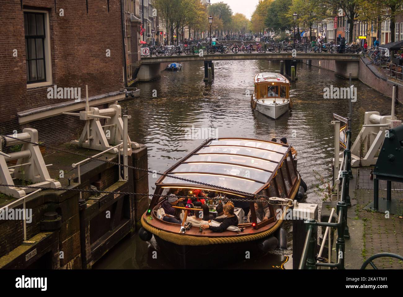Amsterdam, Netherlands. October 2022. The old locks and canal boats at the St. Olofsteeg in Amsterdam. High quality photo Stock Photo