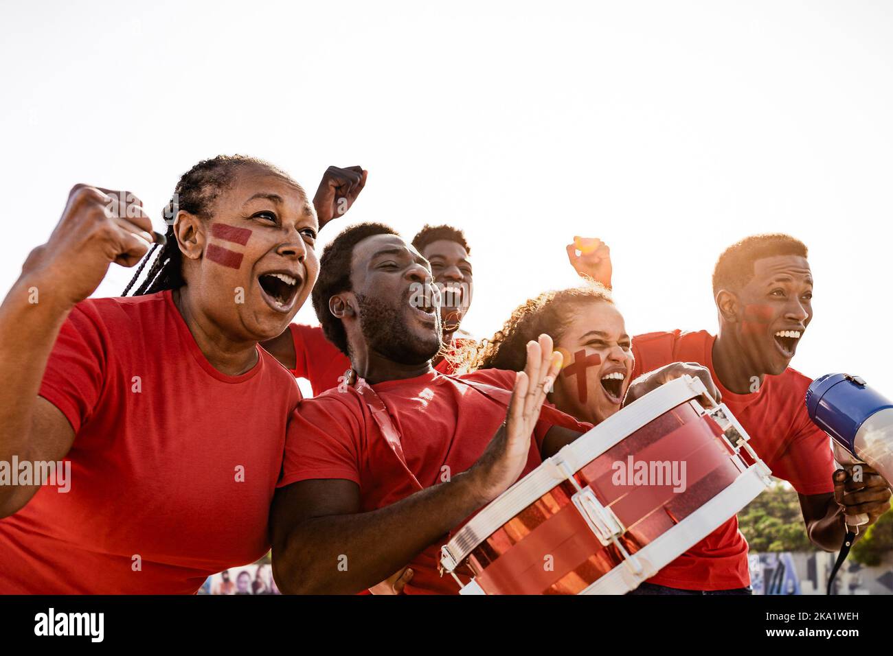 African football fans having fun cheering their favorite team Soccer