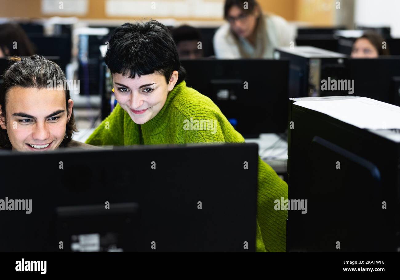 Young classmates studying together in high school - Education concept Stock Photo