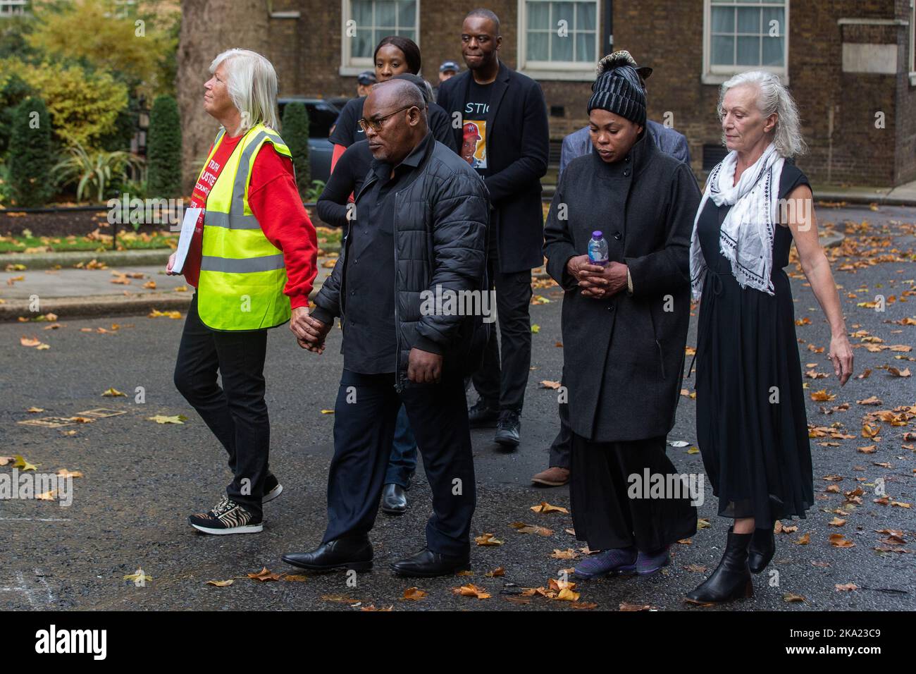 London, UK. 29th October, 2022. Representatives of the United Families & Friends Campaign (UFFC) arrive in Downing Street to present letters to the Prime Minister following their annual procession in remembrance of family members and friends who died in police custody, in prison, in immigration detention or in secure psychiatric hospitals. UFFC was established in 1997 as a support network of black families but now includes the families and friends of people from varied ethnic and cultural backgrounds. There have been 1,838 deaths in police custody or otherwise following contact with the police Stock Photo