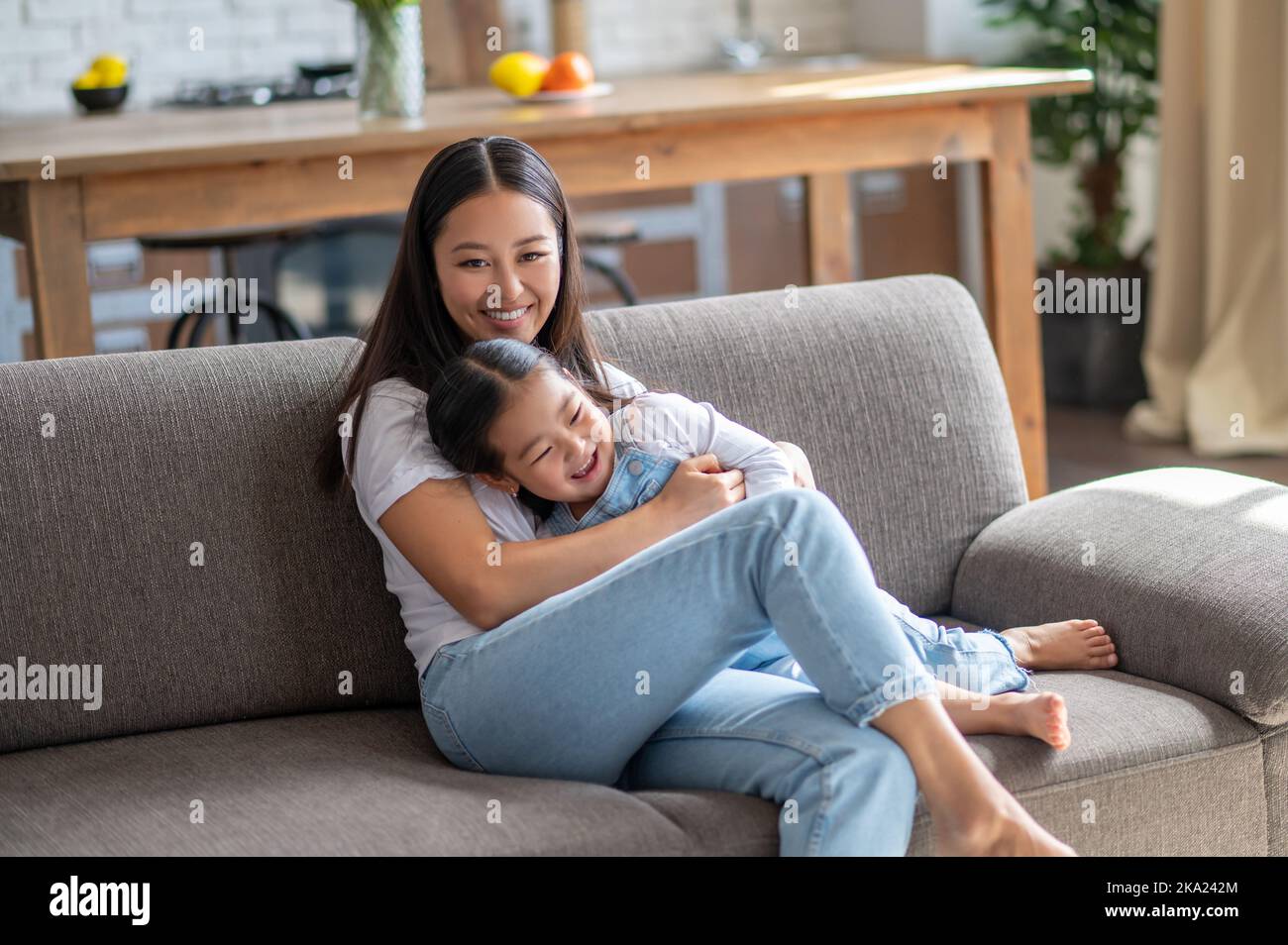 Loving young mother enjoying the company of her child Stock Photo