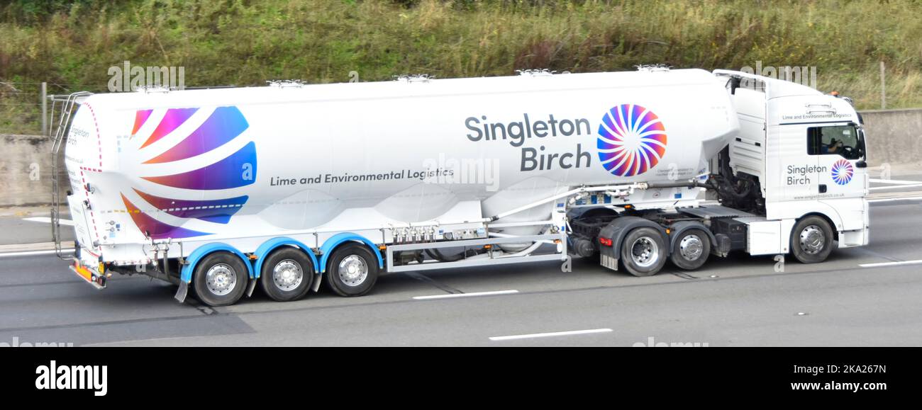 Lorry truck & tanker trailer owned & operated by Hardwick Haulage company for Singleton Birch Lime & environmental logistics business on UK motorway Stock Photo