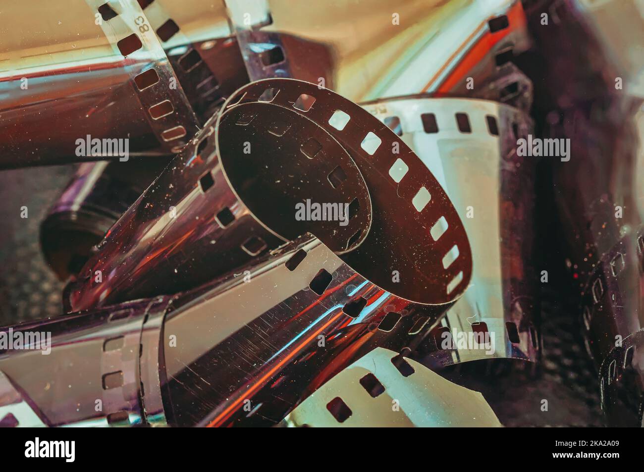 Negative 35 mm film. Rolls of photographic film. Film photo amateur, family archive concept Stock Photo