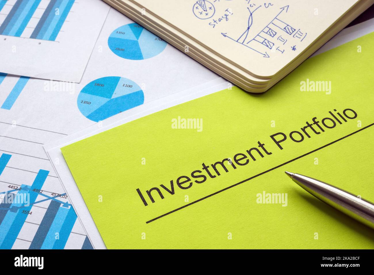 Investment portfolio and report with charts and graphs. Stock Photo