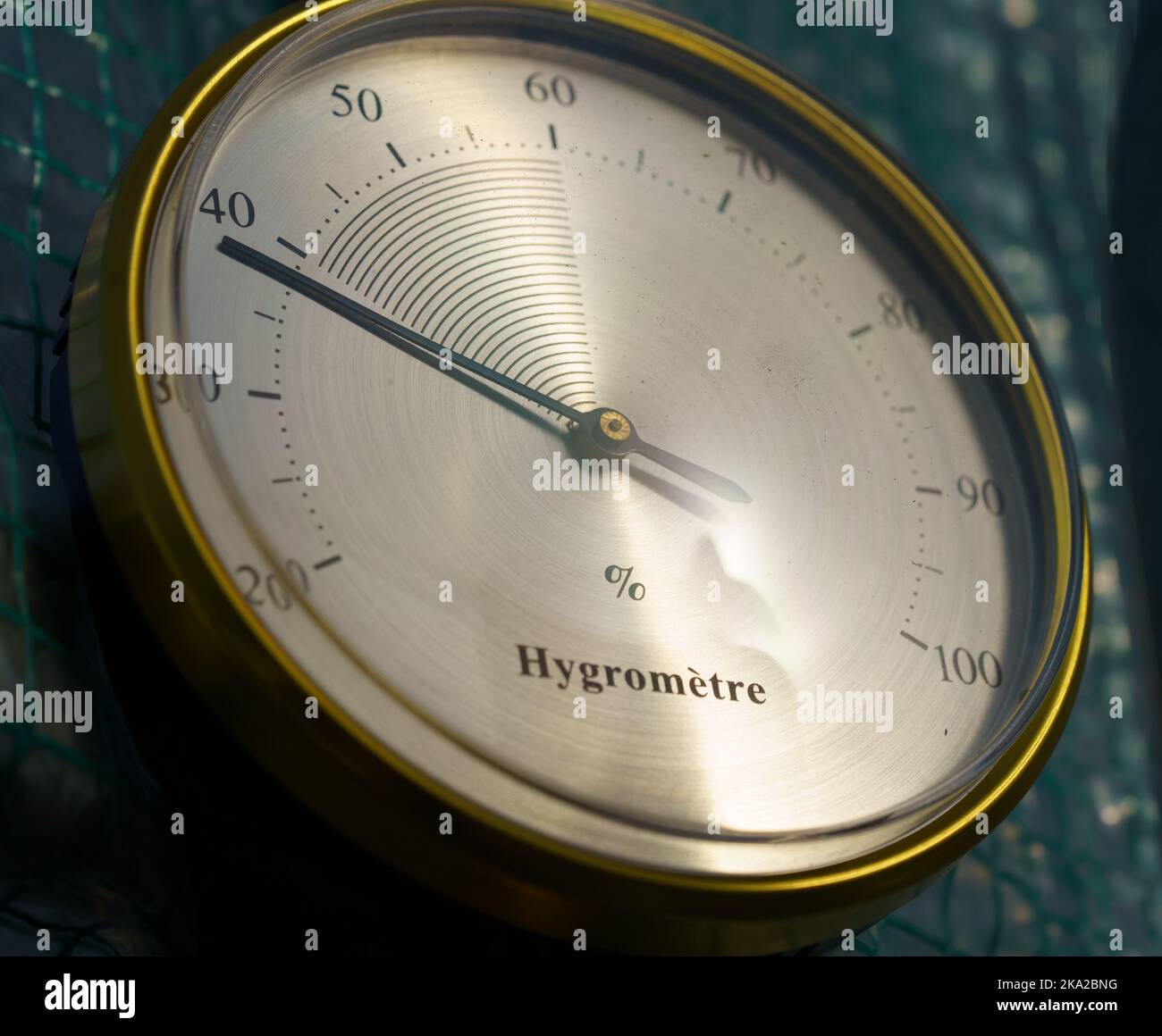 A closeup of a vintage hygrometer. A device used to measure humidity Stock Photo