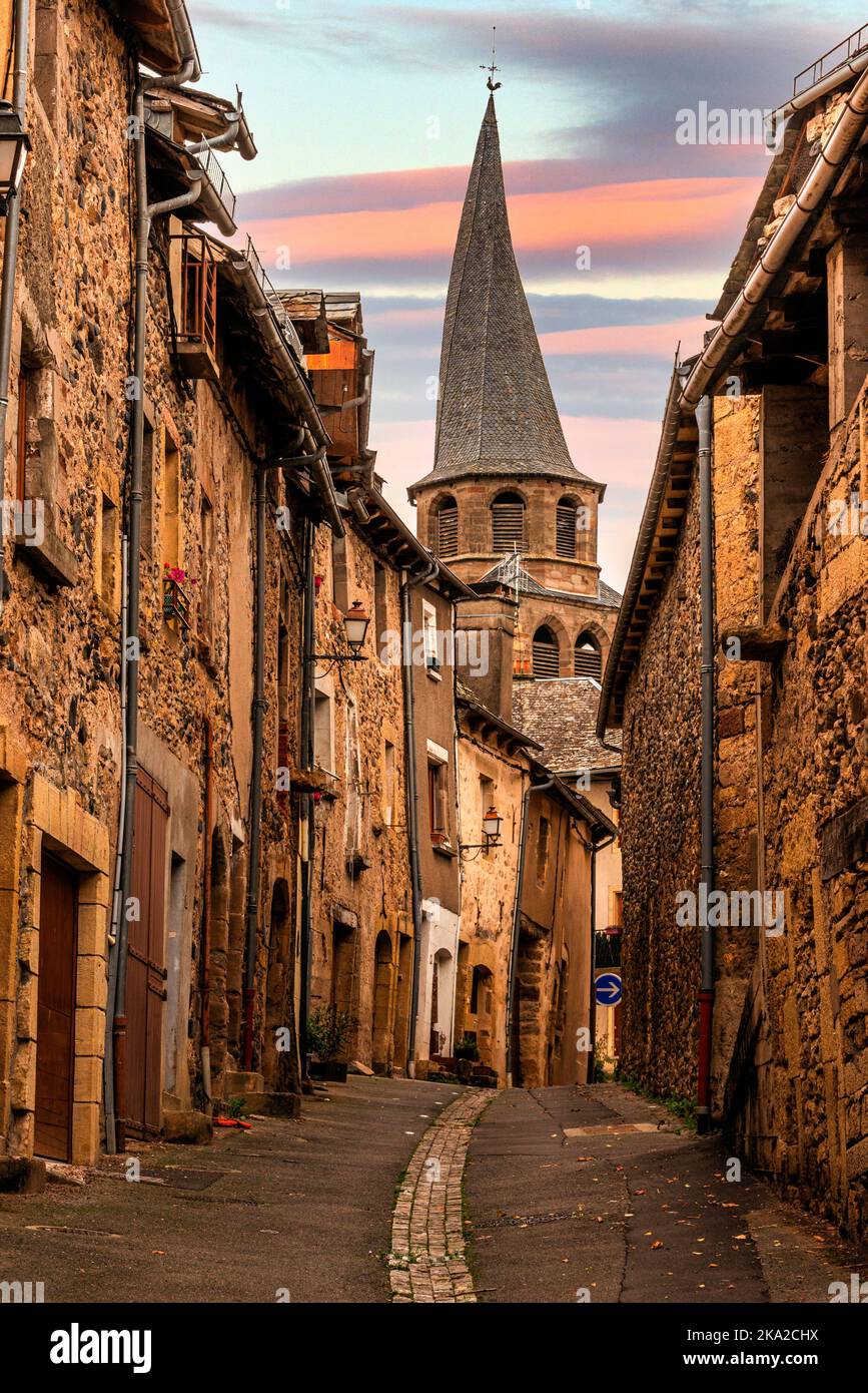 The twisted spire of Saint-Côme-d'Olt, at Saint-Côme-d'Olt in the Aubrac, Occitanie, France Stock Photo
